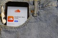 Los Angeles, California, USA - 10 October 2019:  Mobile phone with Soundcloud on App Store, logo on screen close up in the jeans Royalty Free Stock Photo