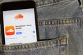 Los Angeles, California, USA - 10 October 2019:  Mobile phone with Soundcloud logo on App Store on screen close up in the blue jea Royalty Free Stock Photo