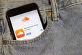 Los Angeles, California, USA - 10 October 2019:  Mobile phone with Soundcloud logo on App Store on screen close up in the jeans Royalty Free Stock Photo