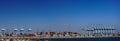 Panorama of large container cargo terminal with gantry cranes in the Port of Los Angeles, California Royalty Free Stock Photo