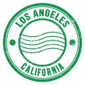 LOS ANGELES - CALIFORNIA, words written on green postal stamp