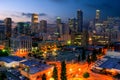 Los Angeles city lights with a display of its skyscrapers, downtown skyline against the dark sky