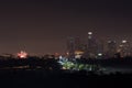 Los Angeles city lights with a display of its skyscrapers, downtown skyline against the night sky Royalty Free Stock Photo