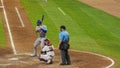 Los Angeles Dodgers baseball player Jason Heyward standing at home plate holding a bat with the Atlanta Braves catcher