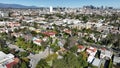 Los Angeles Downtown from Mid Wilshire Aerial Shot Back Tilt Up in California USA