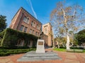 Afternoon sunny view of the Bovard Auditorium with Trojans statue of USC