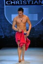 Los Angeles - March 12: A male model walks the runway at the Andrew Christian Fall Winter 2013 fashion show