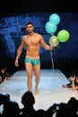 Los Angeles - March 12: A male model walks the runway at the Andrew Christian Fall Winter 2013 fashion show