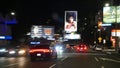 Los Angeles streets at night - traffic, commercials and street lights