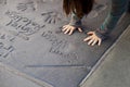 handprints of stars in Hollywood in the concrete of Chinese Theatre's forecourts