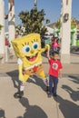 Los Angeles-USA, October, 3: Cartoon Character Sponge Bob Playing with Little Asian Boy at Universal Studios in Los Angeles, Cali
