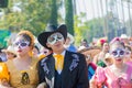 Sugar skull masked dressed as married couple during Day of the D