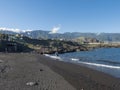 Los Cancajos, La palma, Canary Island, Spain, December 30, 2019: Middle age couple of tourist kissing on coastline of