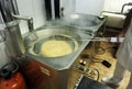 Preparacion de churros en una freidora, comida espaÃÂ±ola deliciosa para el desayuno. Royalty Free Stock Photo