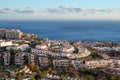 Los Gigantes, Tenerife, Spain - April 20, 2024: Homes and vacation properties with the Atlantic Ocean in the background