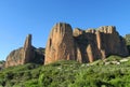 Los Mallos de Riglos unusual shaped red conglomerate rock formation in Spain Royalty Free Stock Photo