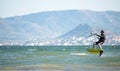 Los Narejos, Spain, May 20, 2020: Sportsman practicing hydrofiol kite surf during phase 1 of de-escalation of Covid-19 at Spanish Royalty Free Stock Photo