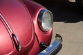 Close up of vintage red Volkswagen Beetle car light Royalty Free Stock Photo
