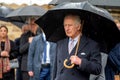 close up portrait of the British king Charles III. under an umbrella during the state vivit in Hamburg Royalty Free Stock Photo