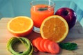 Losing weight, fresh fruits and an orange juice. Royalty Free Stock Photo