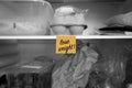 Lose weight written on a post it note stuck on a fridge shelf with food Royalty Free Stock Photo