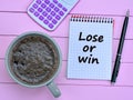 Lose or win words on notebook