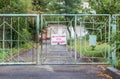 ÃÂ¡losed gate with inscription `No entry for unauthorised people` on Russian. Restricted area or prohibited zone concept