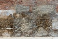 loseup pattern of surface brick wall concrete plaster for vintage background. Colors ocher, white, grey and red. Royalty Free Stock Photo