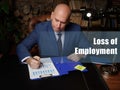 Loss of Employment sign. Closeup portrait of unrecognizable successful businessman wearing formal suit reading documents