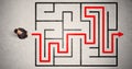 Lost businessman found the way in maze with red arrow Royalty Free Stock Photo