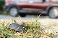 Lost car keys on the ground, Car keys dropped on the floor or fall lying on the street home front. Walking Away From Lost Car Key Royalty Free Stock Photo