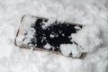 Lost cell phone is in the snow