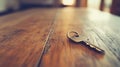 Lost or Found A Key on a Rustic Wooden Surface Light in the Background Royalty Free Stock Photo