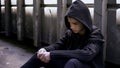 Lost in life teenager sitting in abandoned house, escape from home, misbehavior Royalty Free Stock Photo