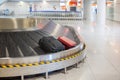 Lost luggage at the airport. Baggage sorting - Luggage on conveyor Royalty Free Stock Photo