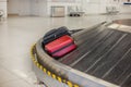 Lost luggage at the airport. Baggage sorting - Luggage on conveyor Royalty Free Stock Photo