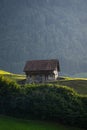 Lost old house. Alps old wooden home. Old House in the European Alps. Old Cabin in the forest. Dilapidated house in the Royalty Free Stock Photo