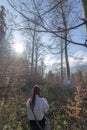 Lost redhead pretty girl in a vegetation forest Royalty Free Stock Photo