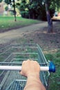 Lost with shopping cart in park