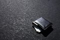 Lost Wallet Lying on Street or Road Royalty Free Stock Photo