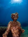 Statue of Dionysus with a crown of ivy in ClaudioÃ¢â¬â¢s Ninfeum. underwater, archeology.