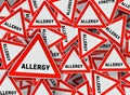 A lot of allergy triangle road sign