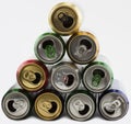 A lot of aluminum cans empty from drinks. Many empty cans. A lot of opened soda, soft drink, lemonade, cola, beer Royalty Free Stock Photo