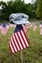 A lot of american flags and army cap Royalty Free Stock Photo