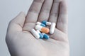 A lot of antibiotic pills in the hand Royalty Free Stock Photo