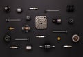Lot of auto parts: valves, spark plugs, silent blocks, thermostats, chain, filter, and other, lie isolated on a black background