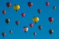 A lot of balloons start they flight in the blue sky Royalty Free Stock Photo