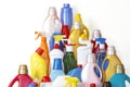 A lot of bottles with chemicals for cleaning. Different plastic bottles in the form of mountain. Royalty Free Stock Photo