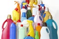 A lot of bottles with chemicals for cleaning. Different plastic bottles in the form of mountain. Royalty Free Stock Photo