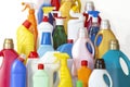 A lot of bottles with chemicals for cleaning. Different plastic bottles in the form of mountain. Royalty Free Stock Photo